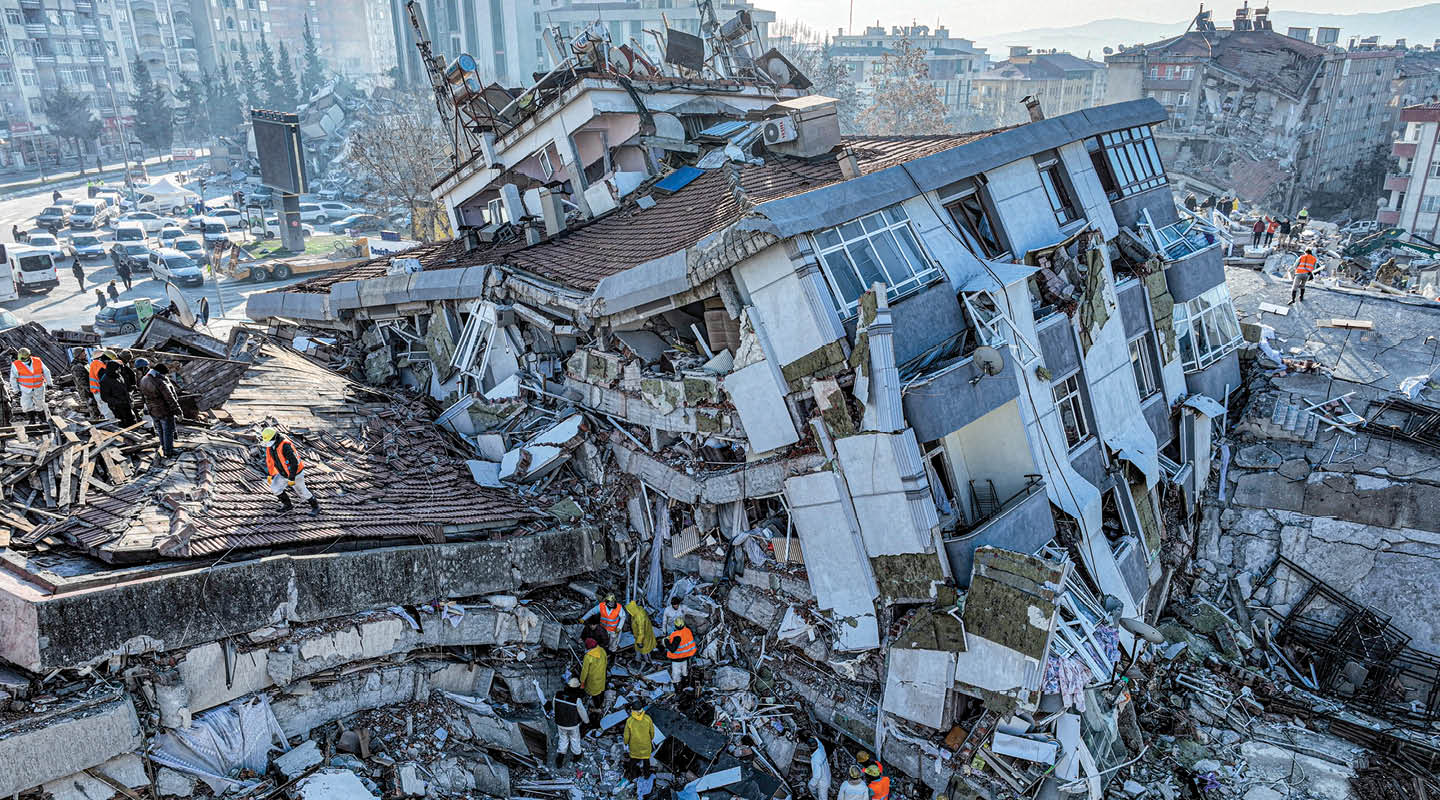 Bird&apos;s eye view of destroyed city buildings after earthquake