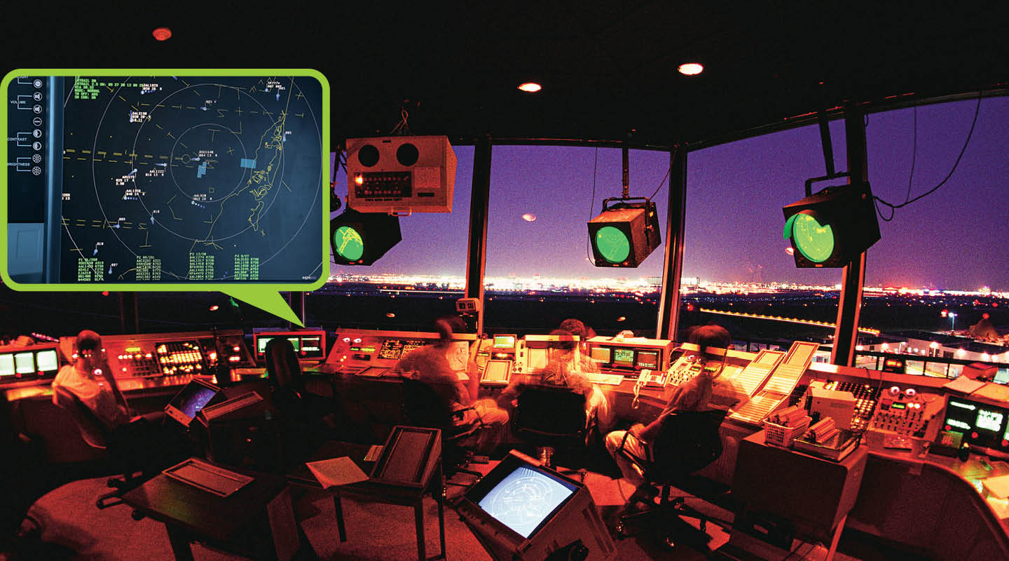 Image of flight trackers at work